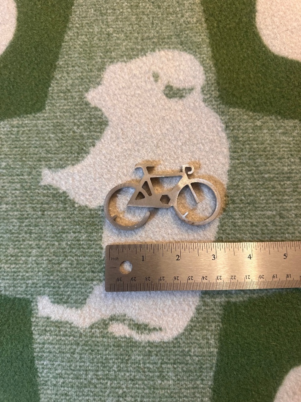 Crafted bicycle bottle opener-